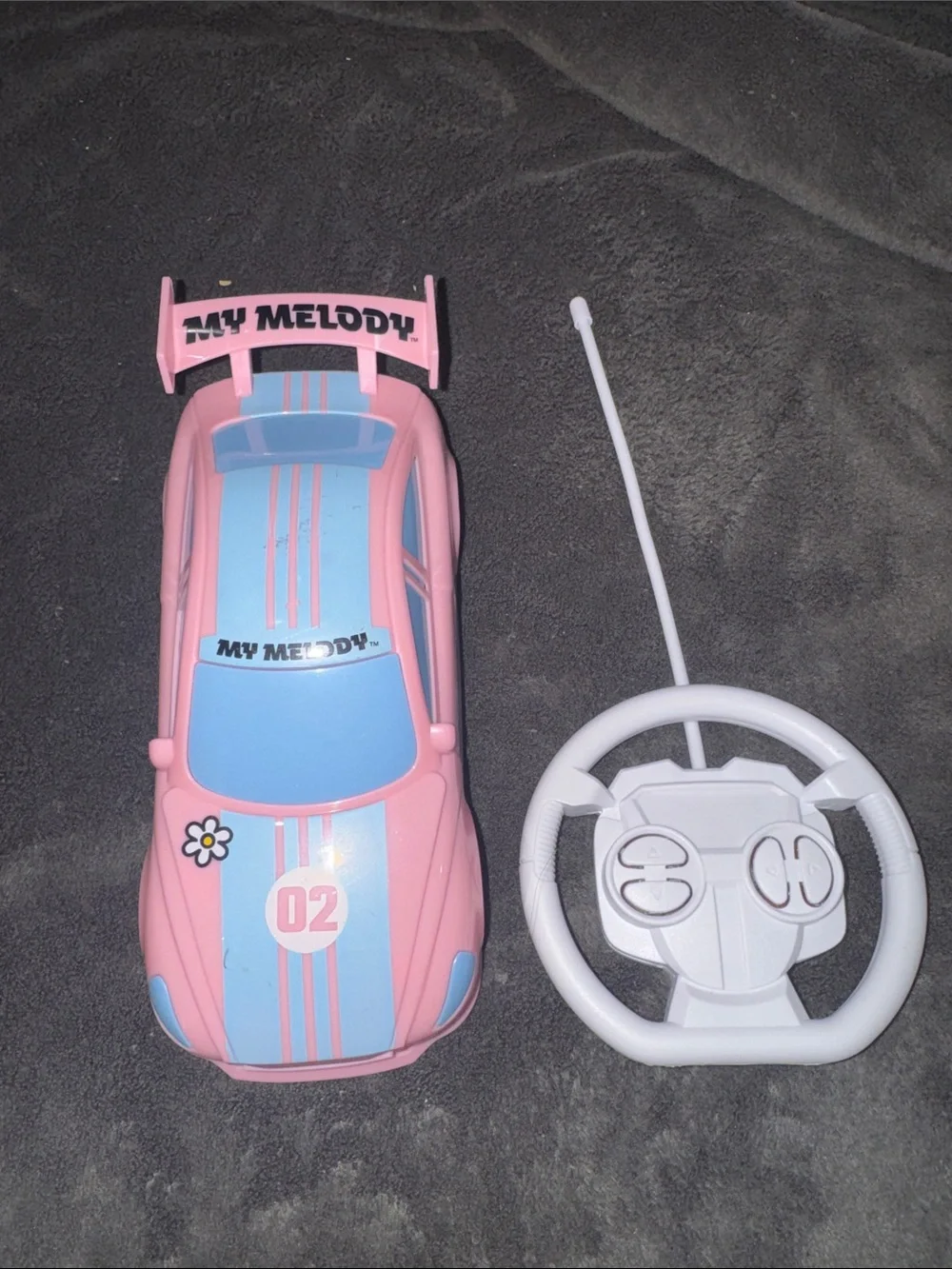 Used but works Sanrio My Melody Pink and Light Blue Remote Control Race Car